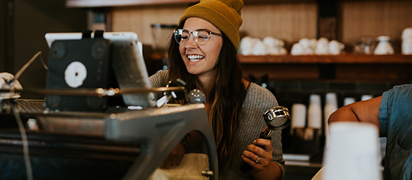 female-barista-making-coffee