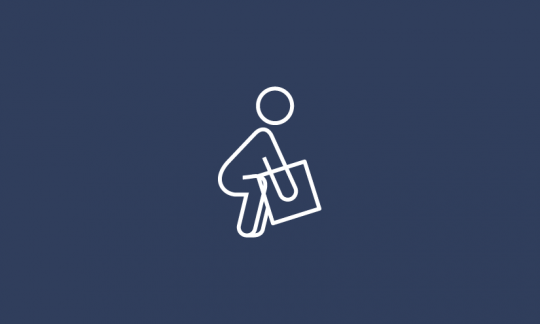 Icon of a person bending to lift a box